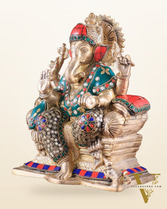 Brass Ganesha on a sofa embossed idol 10 inch