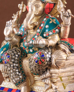 Brass Ganesha on a sofa embossed idol 10 inch