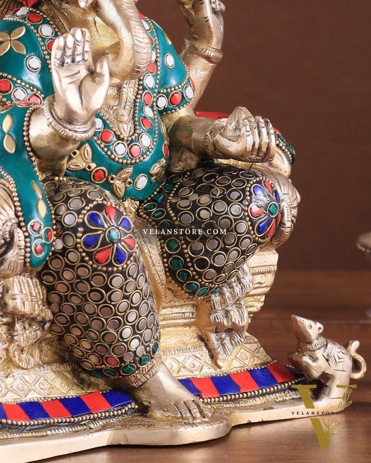Brass Ganesha on a sofa embossed idol 10 inch
