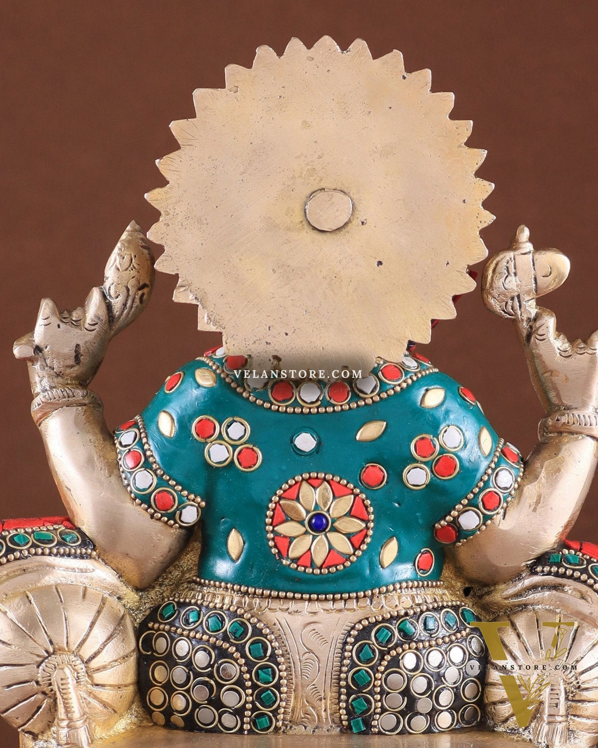 Brass Ganesha on a sofa embossed idol 10 inch