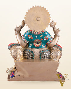 Brass Ganesha on a sofa embossed idol 10 inch
