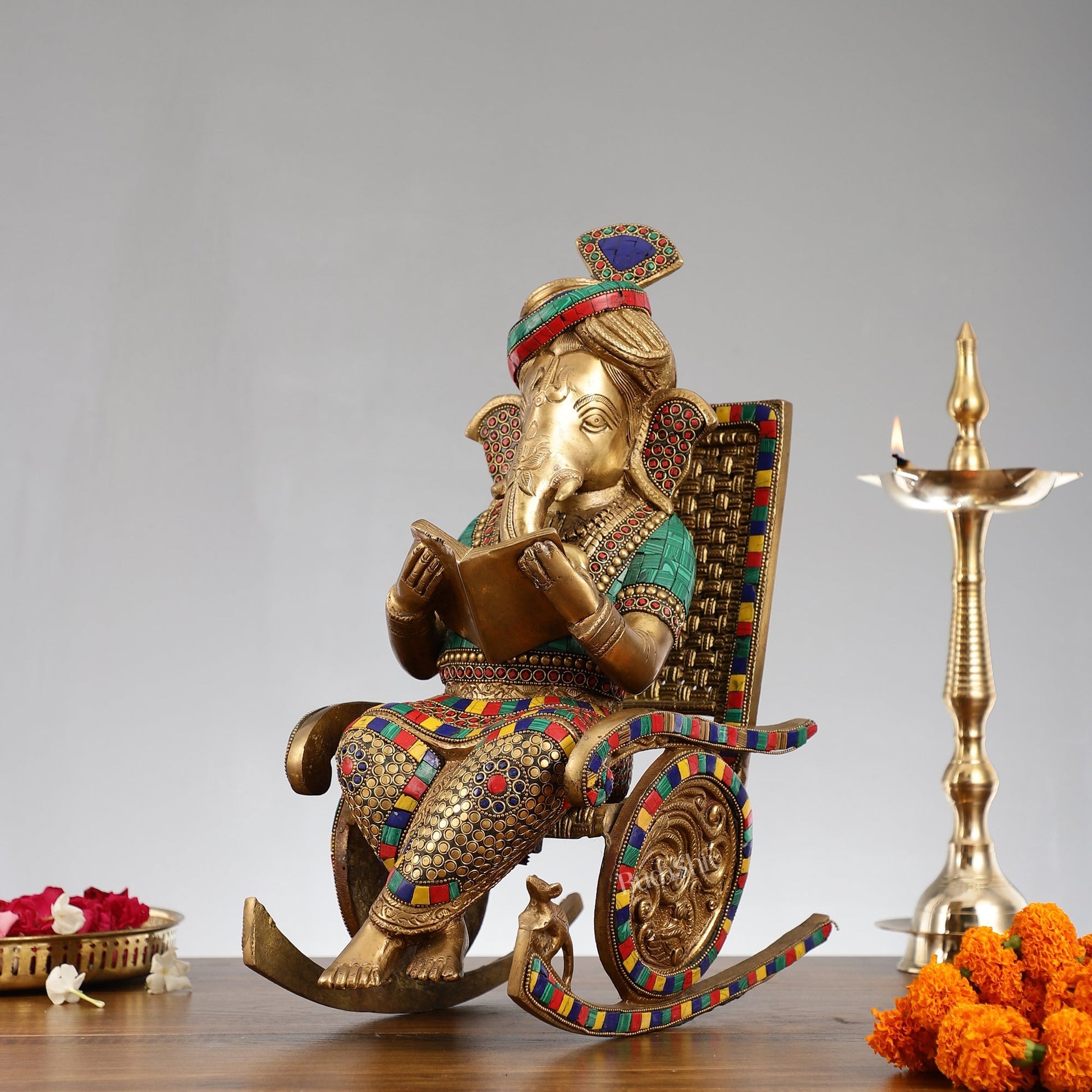Brass Ganesha reading sitting on Chair 17"