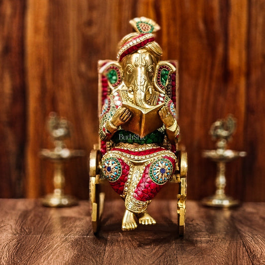 Brass reading Ganesha on Rock on Chair 17"