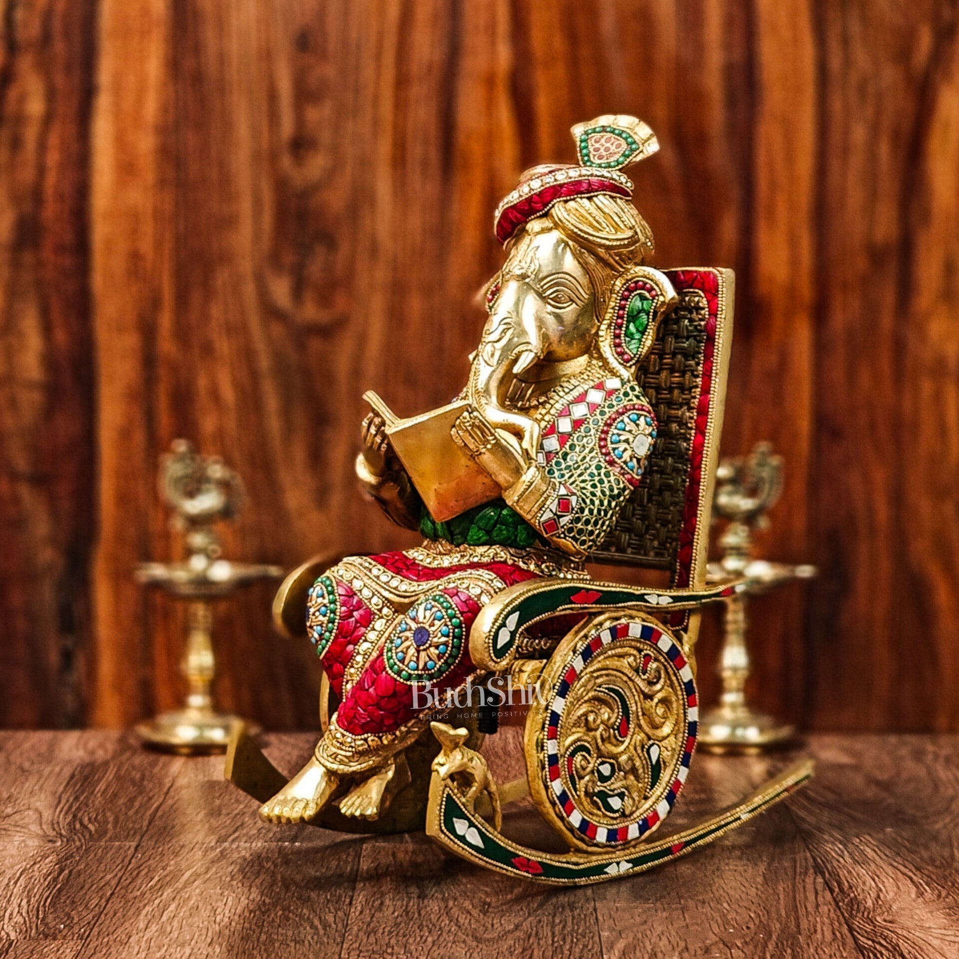 Brass reading Ganesha on Rock on Chair 17"