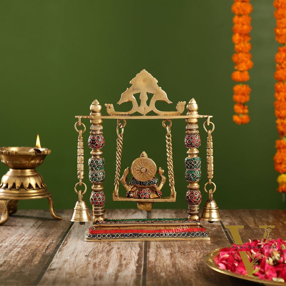 Brass Ganesha on Swing with Meenakari Stonework | Fine Craftsmanship