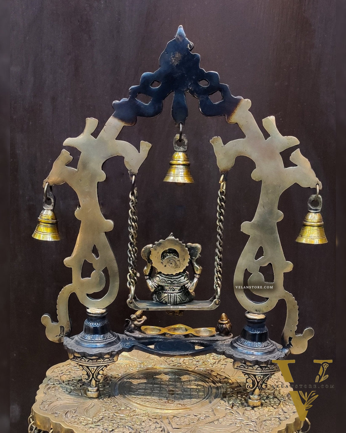 Brass Ganesha on swing with three diyas 13"
