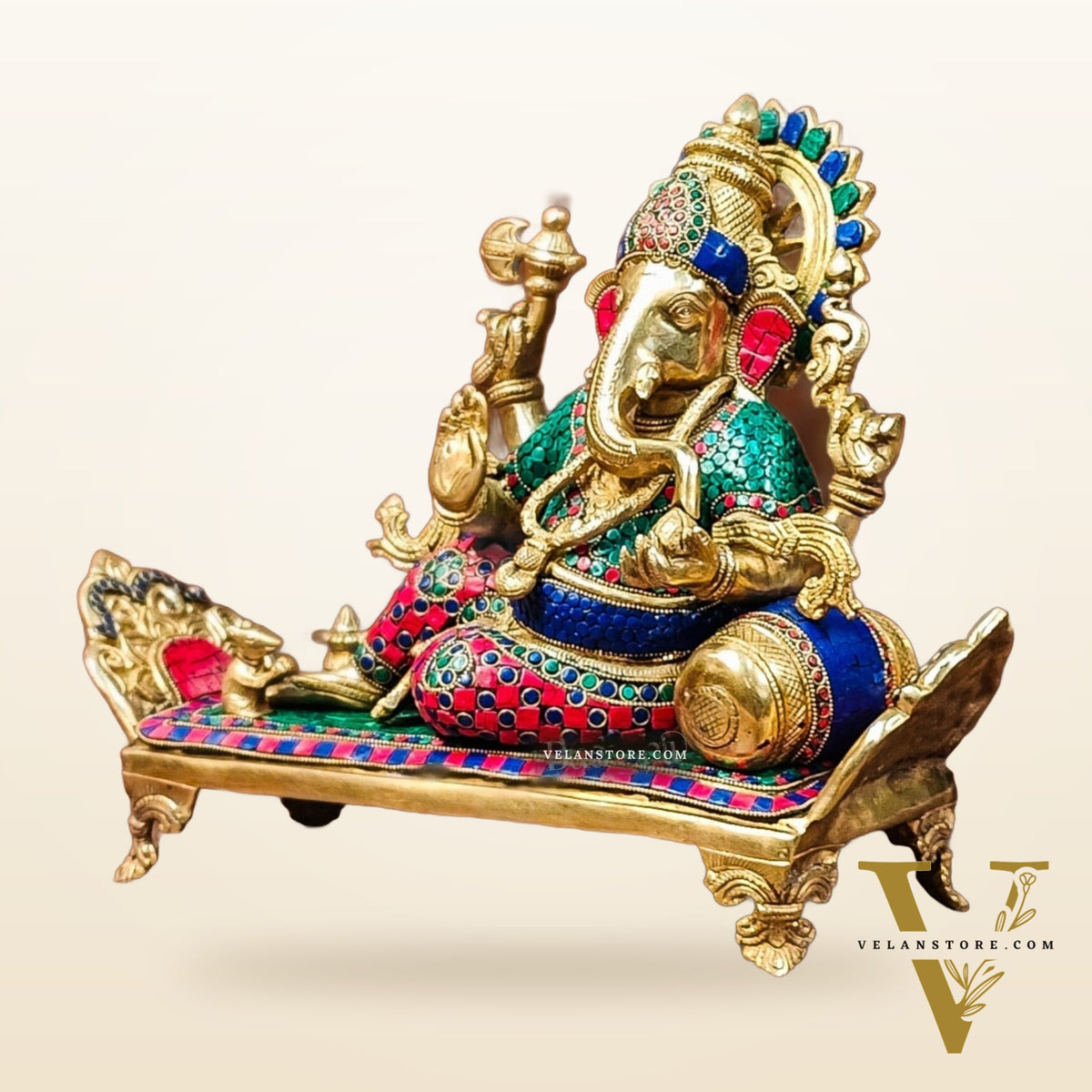 Brass Ganesha resting on diwan statue 13"