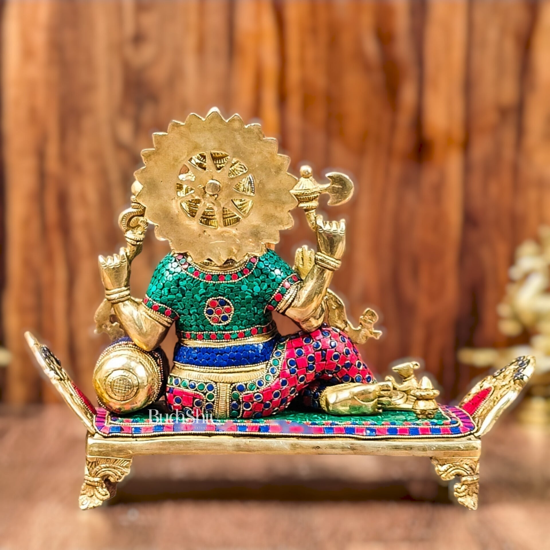 Brass Ganesha resting on diwan statue 13"