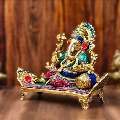 Brass Ganesha resting on diwan statue 13"
