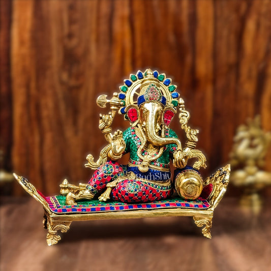 Brass Ganesha resting on diwan statue 13"