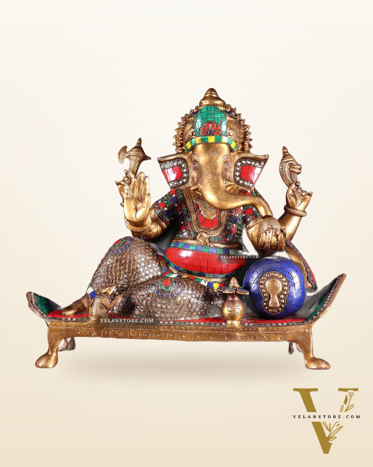 Brass Ganesha resting Statue with Stonework - 16 Inch