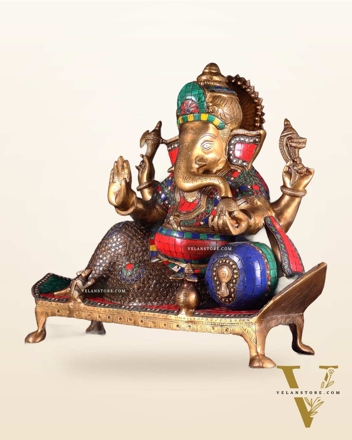 Brass Ganesha resting Statue with Stonework - 16 Inch
