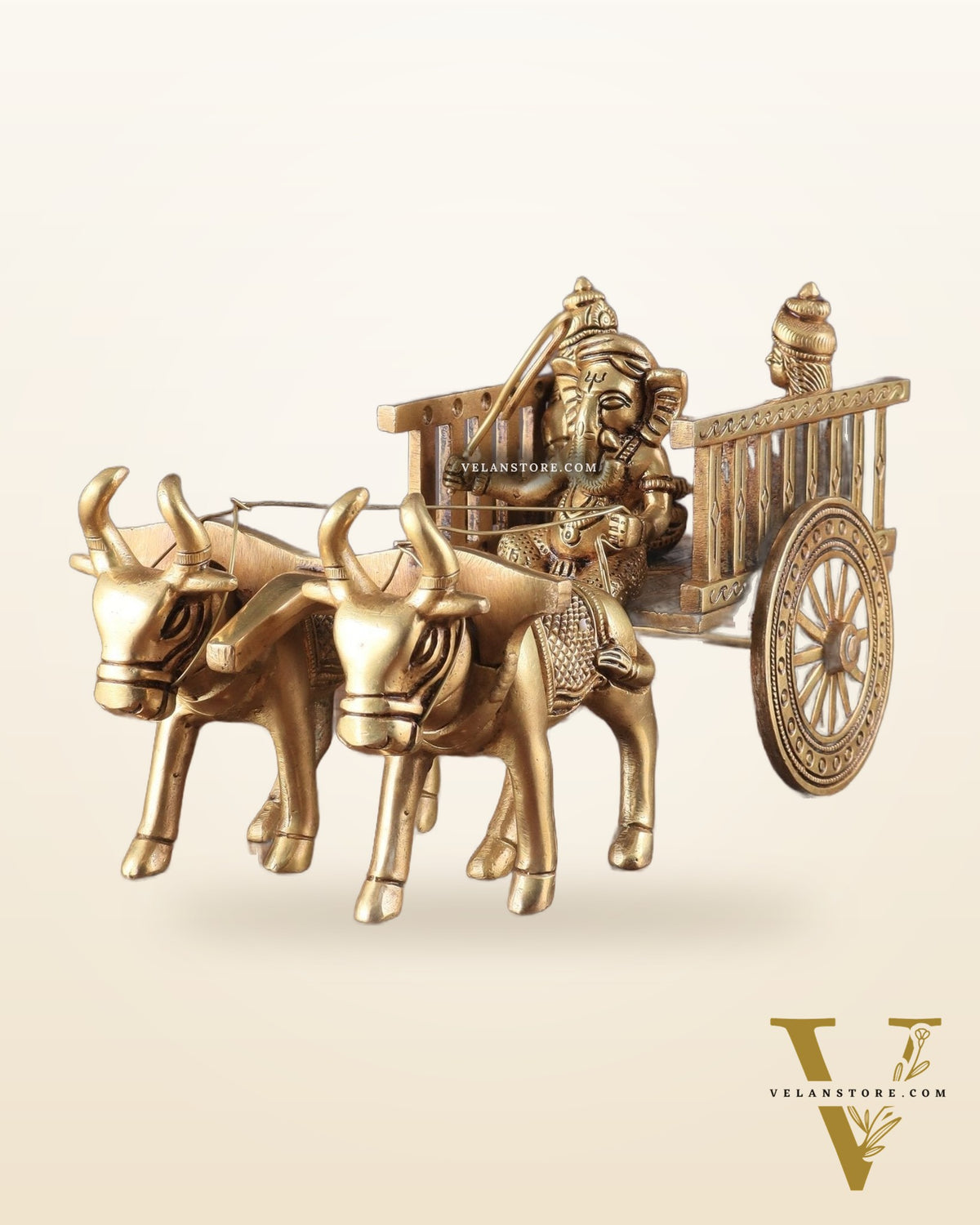 Brass Ganesha showpiece bullock cart with riddhi siddhi enhanced carvings