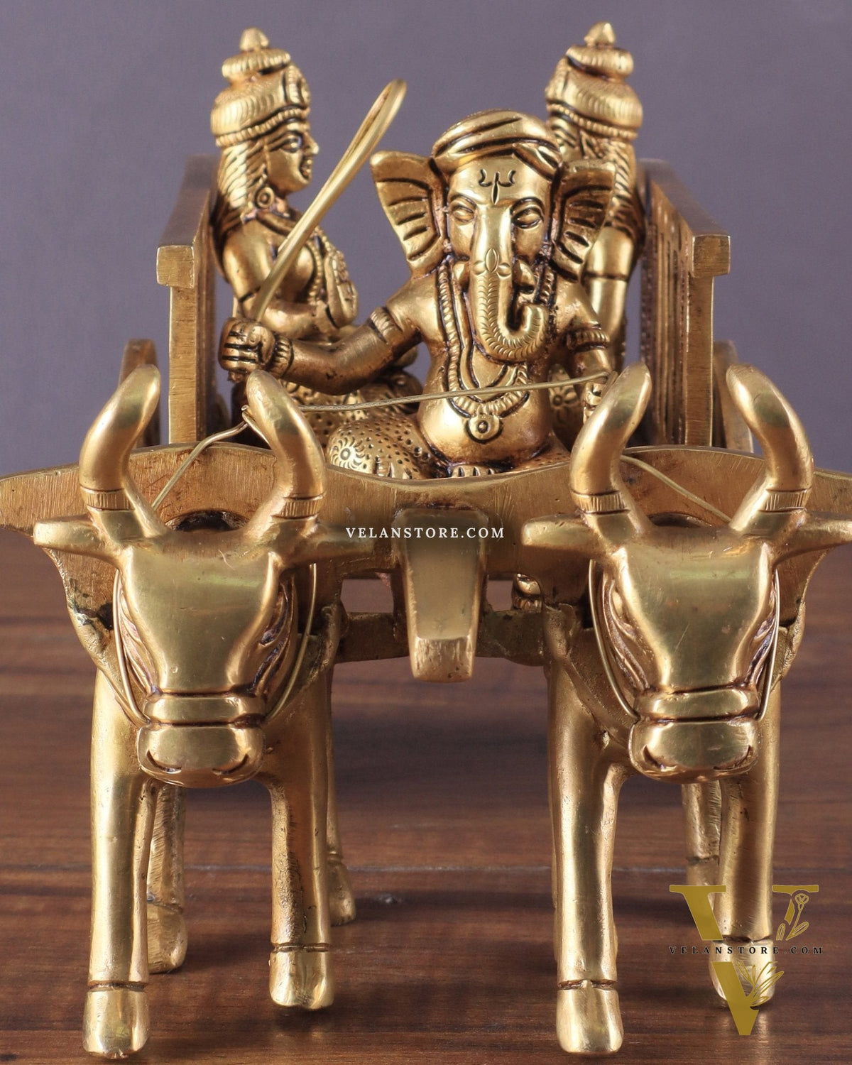 Brass Ganesha showpiece bullock cart with riddhi siddhi enhanced carvings