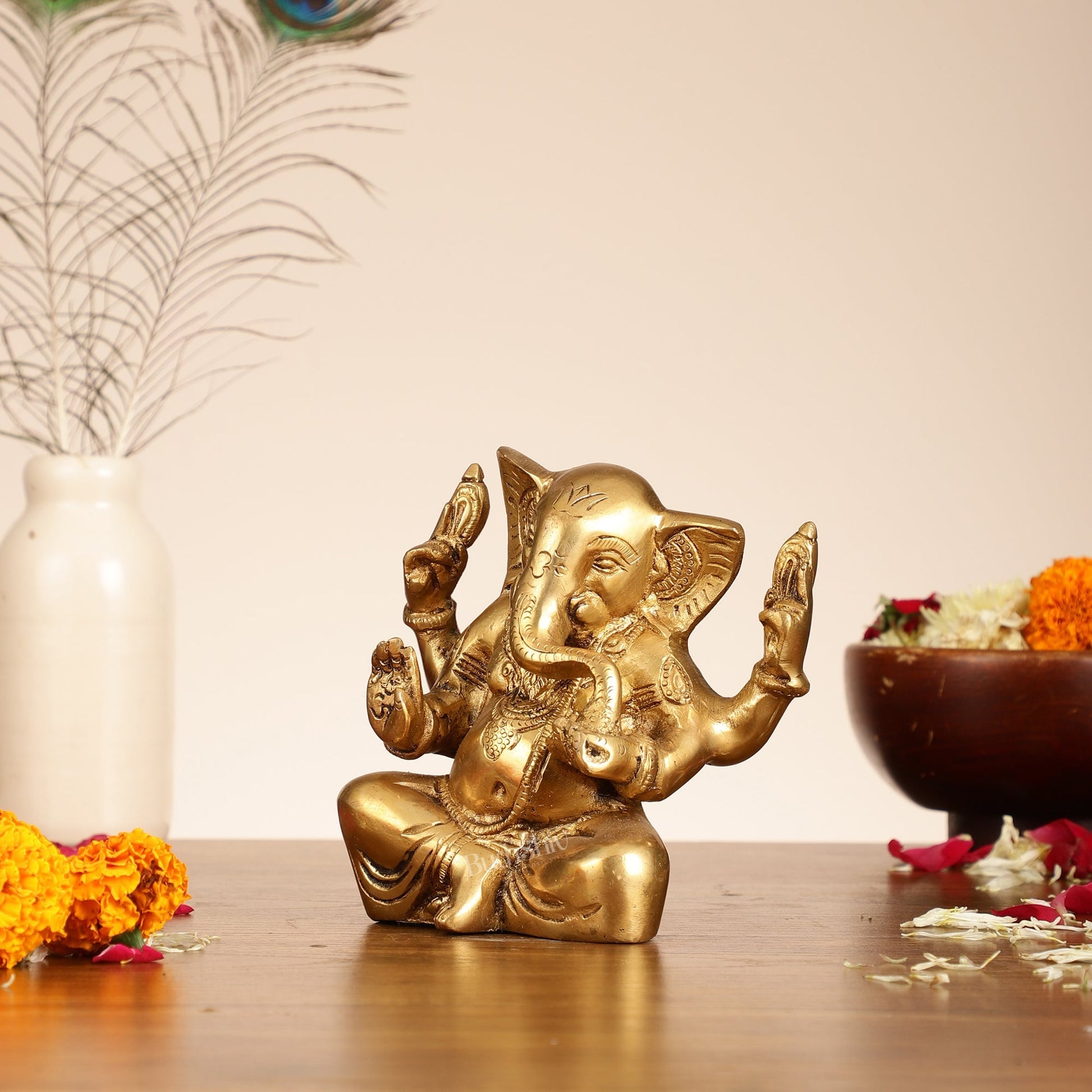 Brass Ganesha statue with tilted head 7 inch