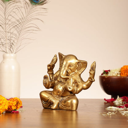 Brass Ganesha statue with tilted head 7 inch
