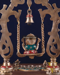 Brass Ganesha Swing with Three Diyas 13.5"