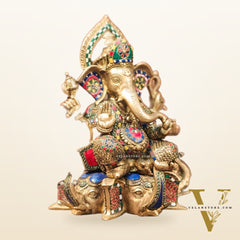 Brass Handcrafted Ganapathi Statue Seated on Three Elephant Heads 17"