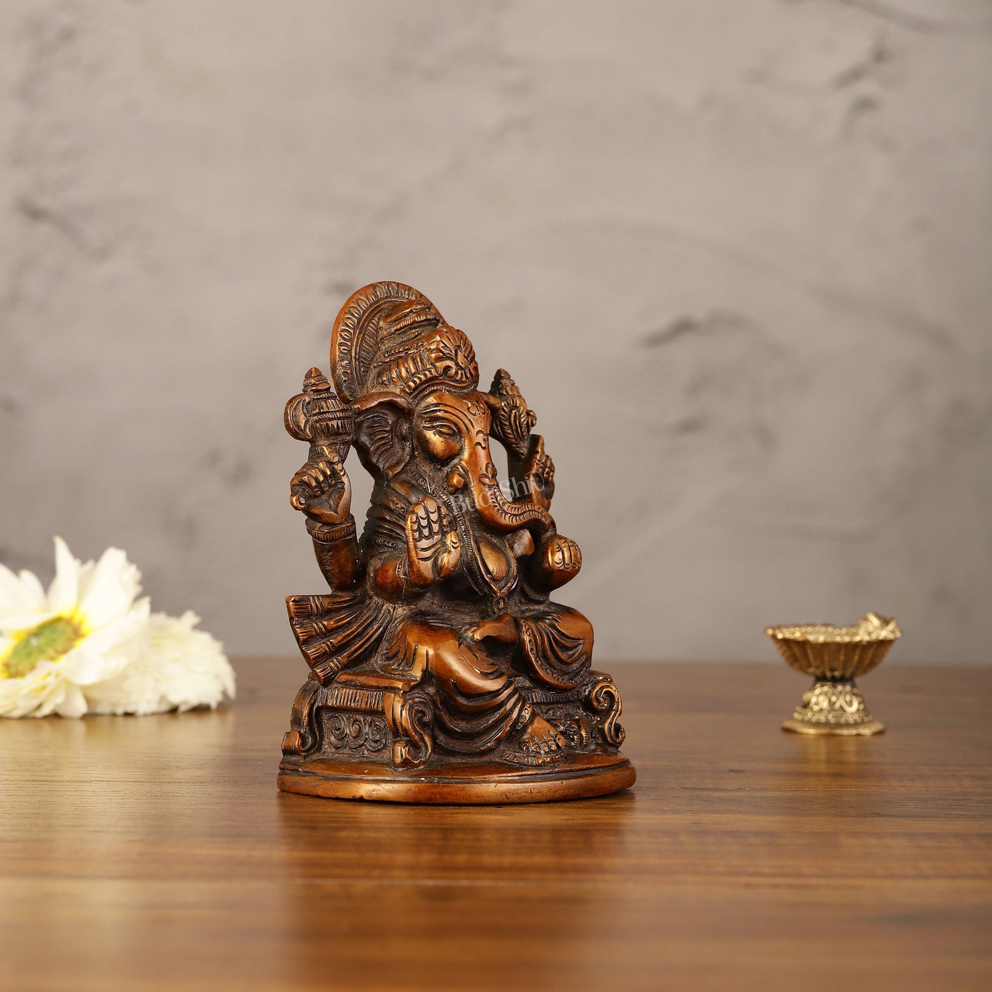 Brass Handcrafted Ganesha Idol Seated on Chair 5"