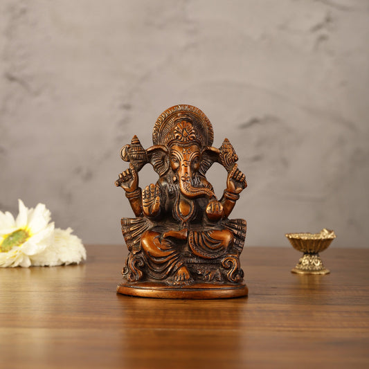 Brass Handcrafted Ganesha Idol Seated on Chair 5"