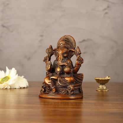Brass Handcrafted Ganesha Idol Seated on Chair 5"