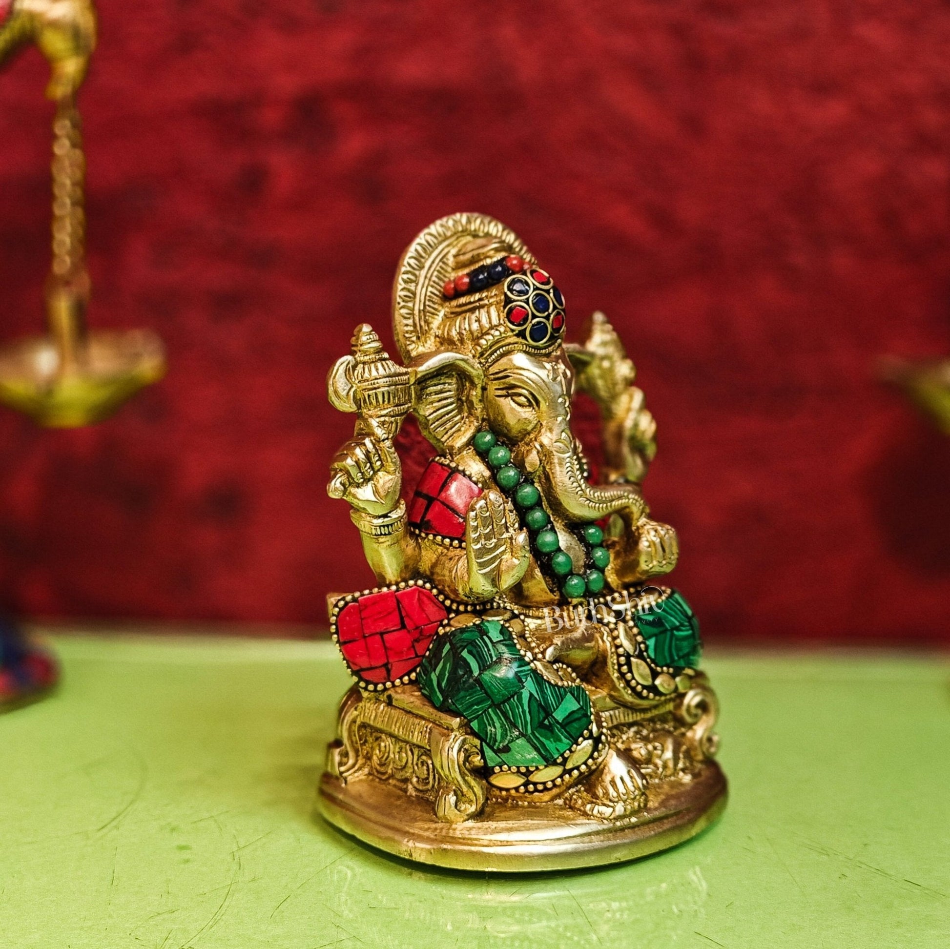 Brass Handcrafted Ganesha Idol Seated on Chair with Natural Stones 5.5"