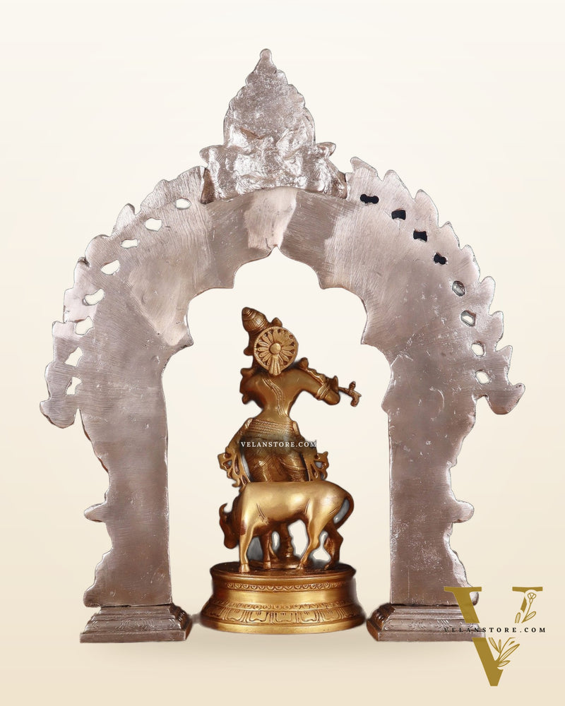 Brass Krishna with Cow Idol & Silver-Plated Prabhavali Arch – Divine spiritual Set