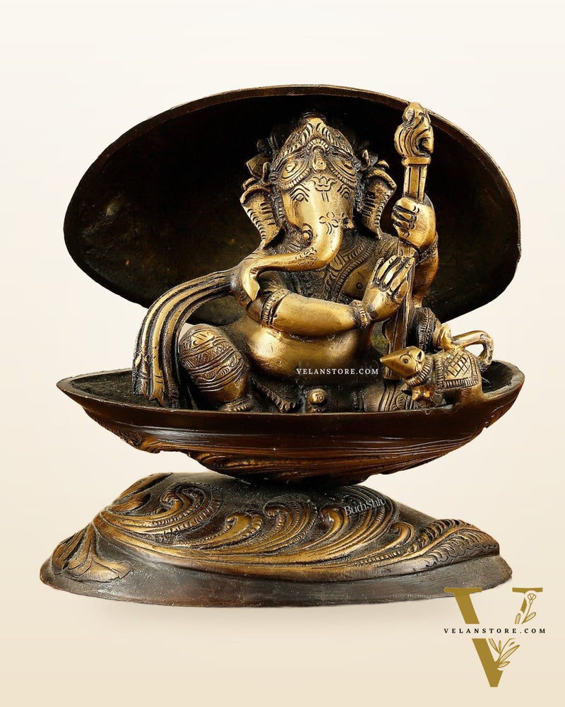 Brass Lord Ganesha Playing Veena Inside Shell – 7”