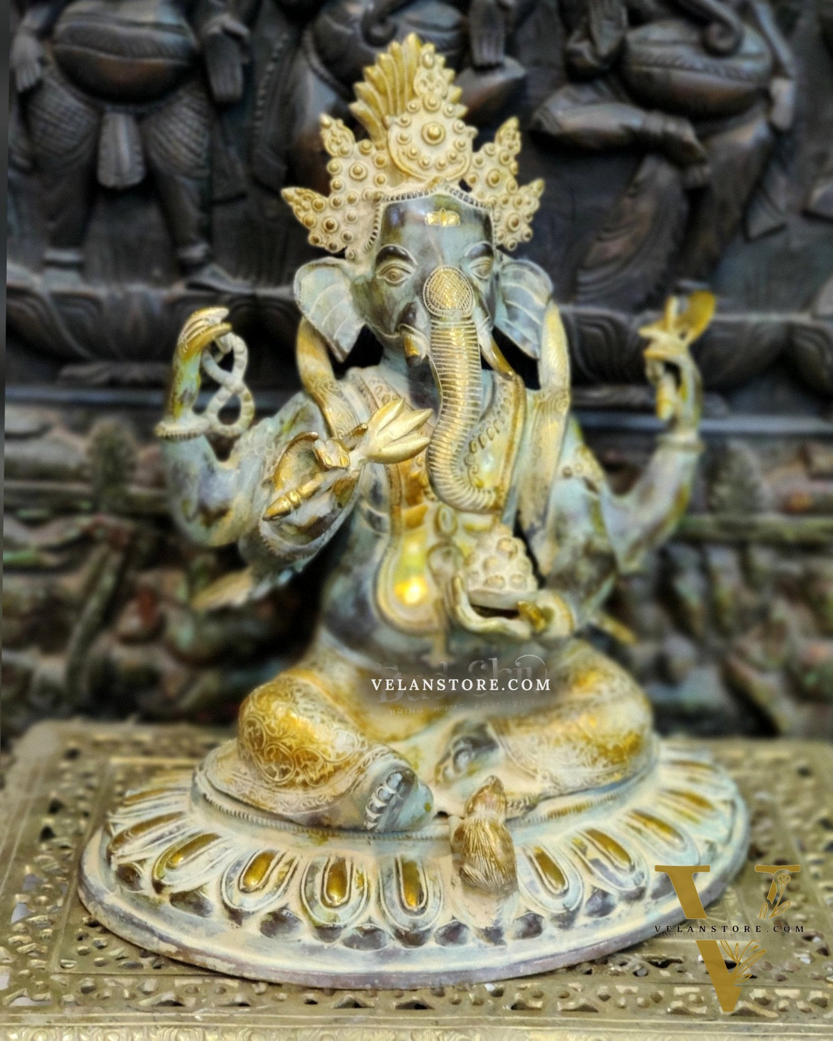 Brass Nepalese Style Ganesha seated on a round base.