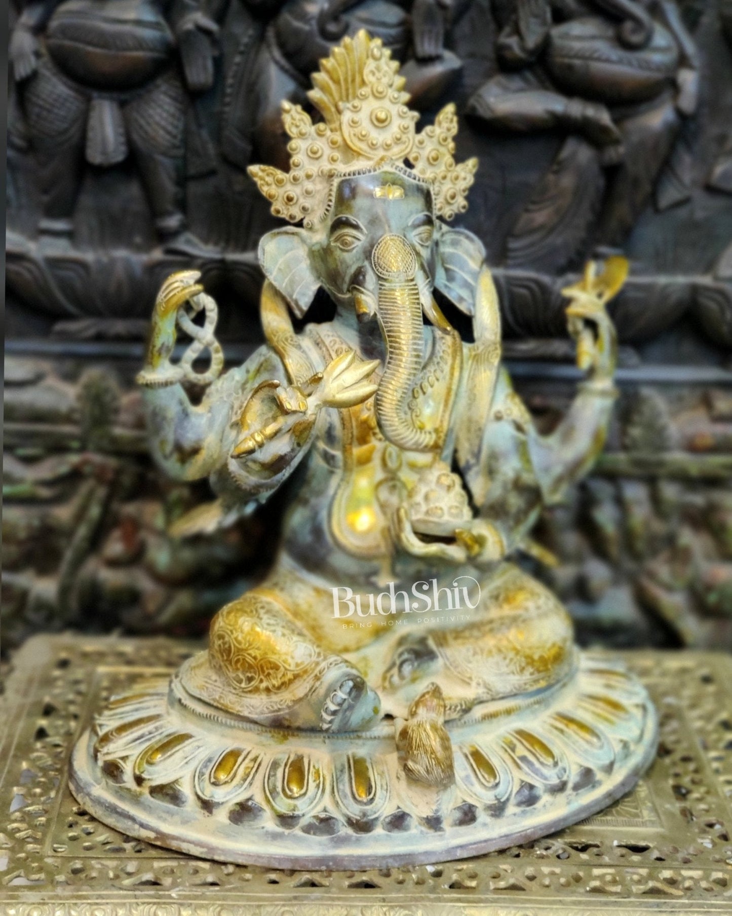 Brass Nepalese Style Ganesha seated on a round base.