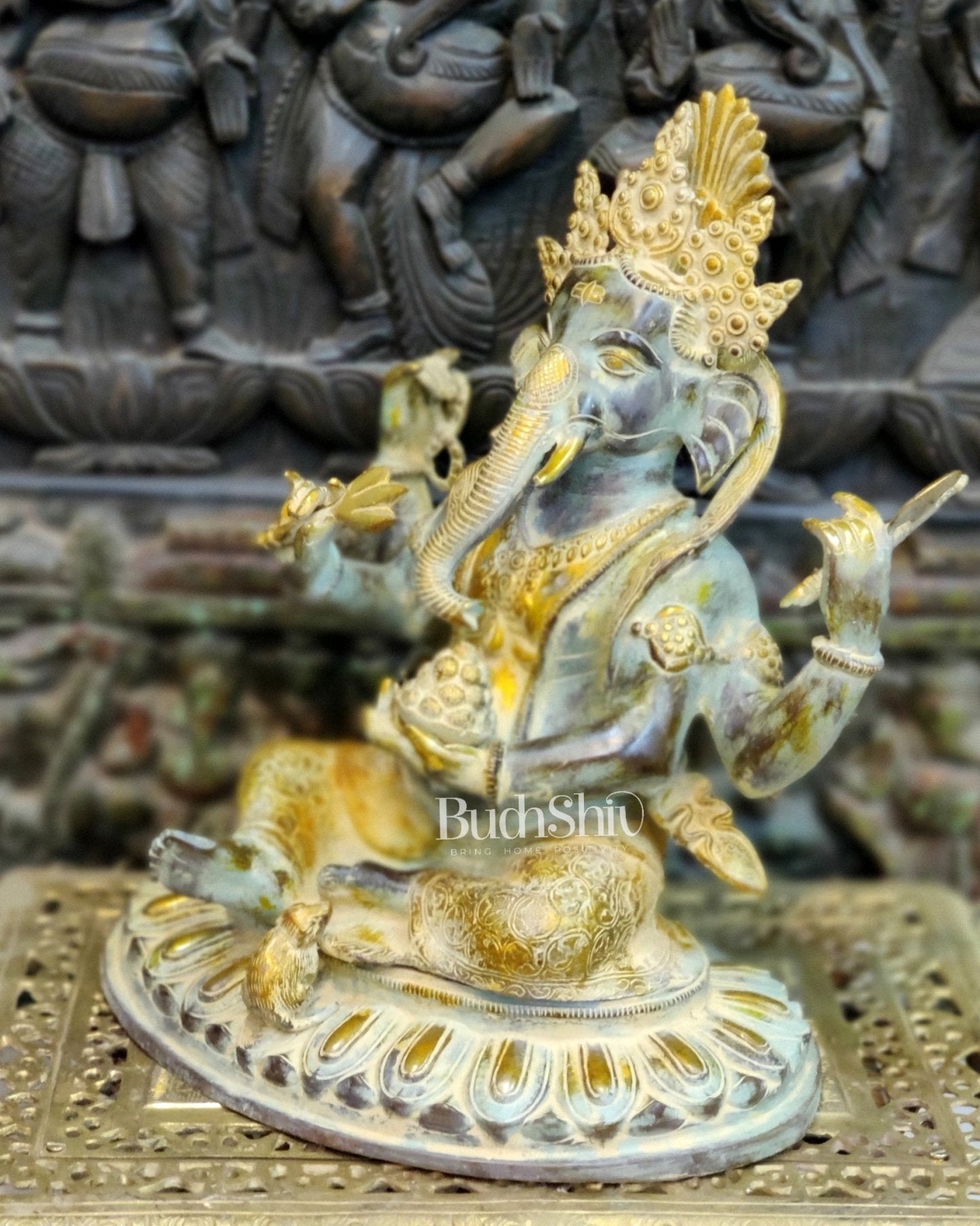Brass Nepalese Style Ganesha seated on a round base.
