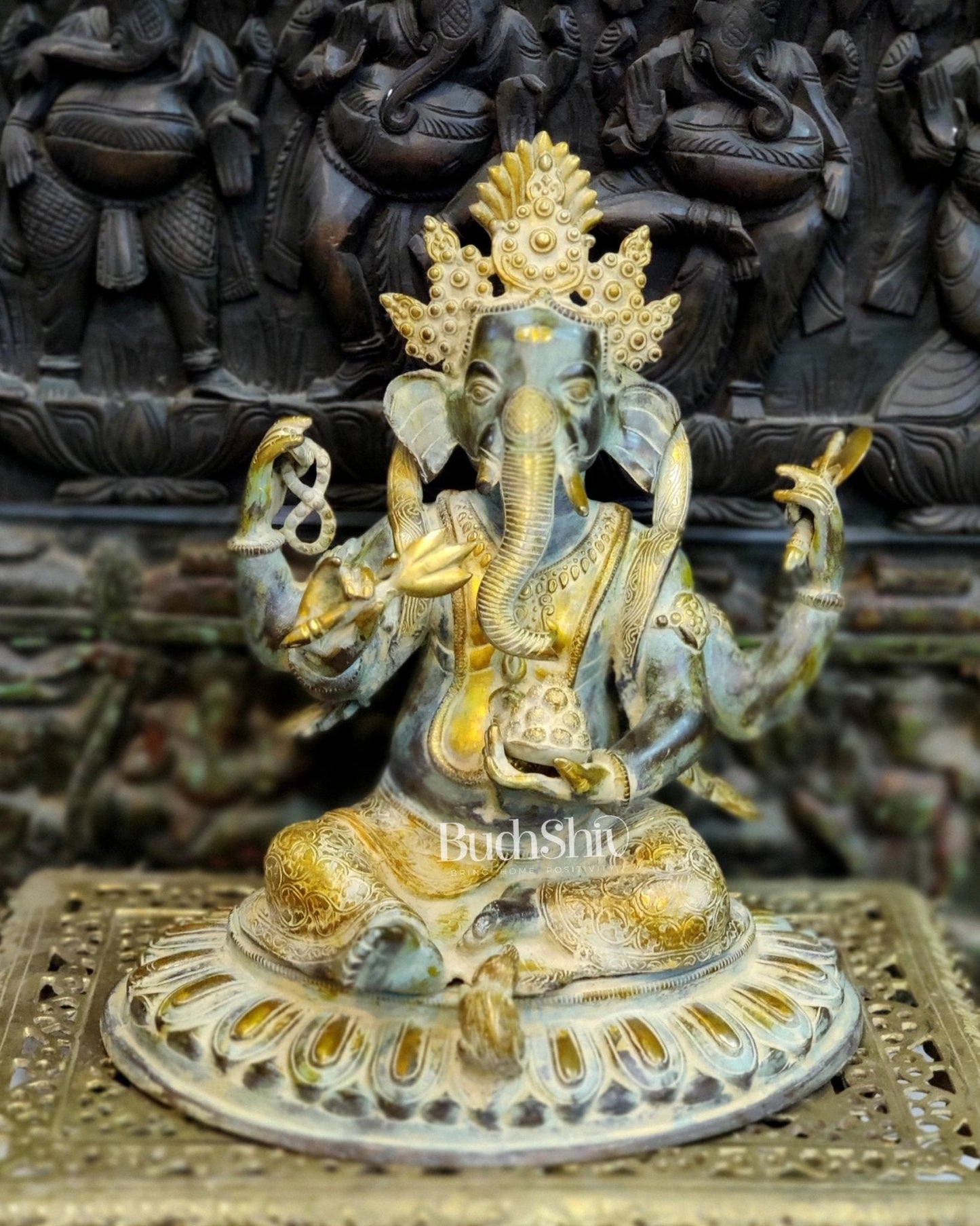Brass Nepalese Style Ganesha seated on a round base.