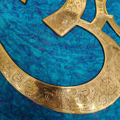 Brass Om Wall hanging 12"