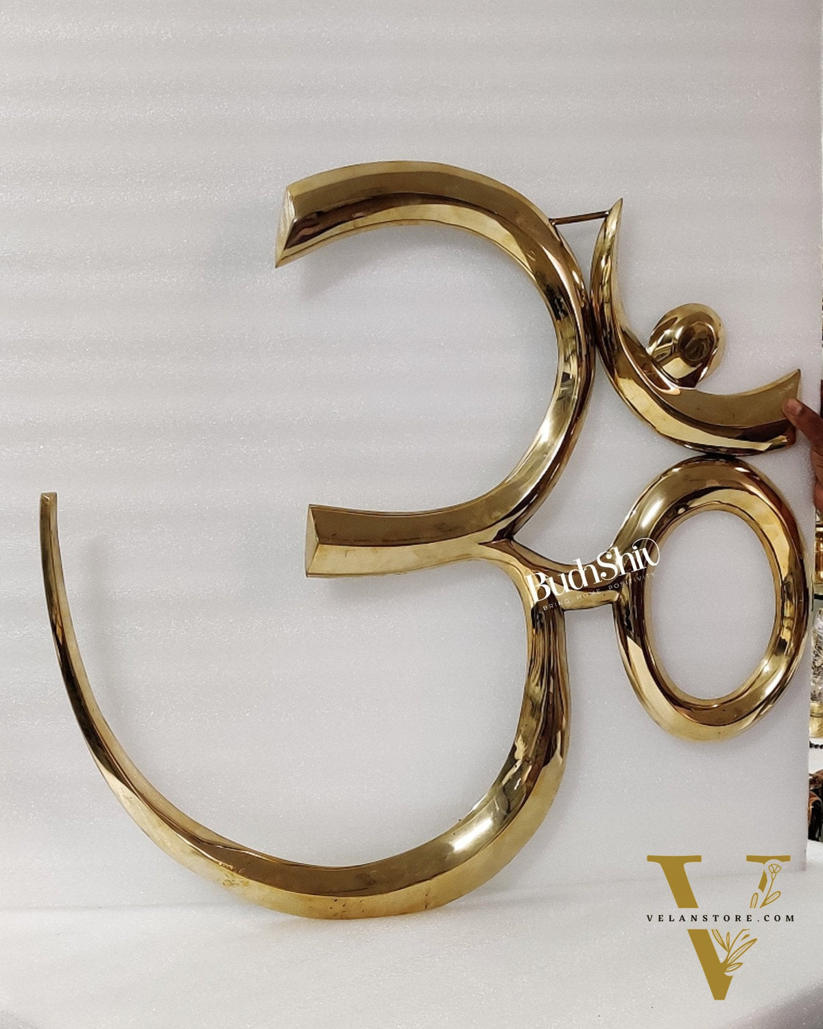 Brass OM wall hanging inches