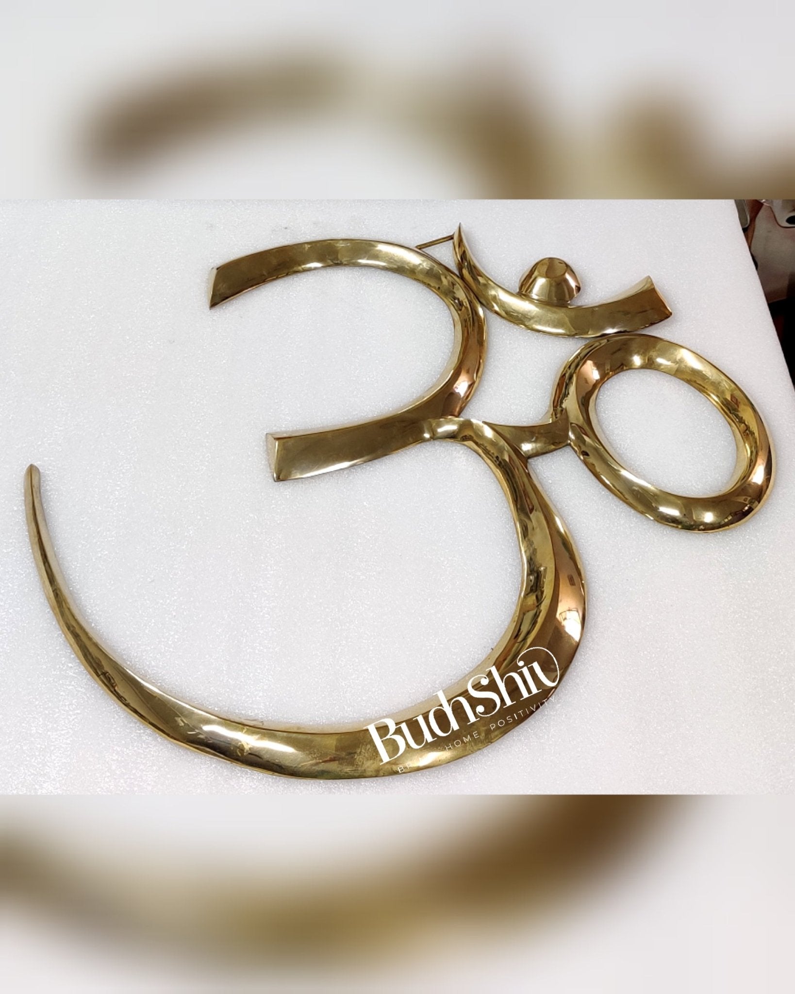 Brass OM wall hanging inches