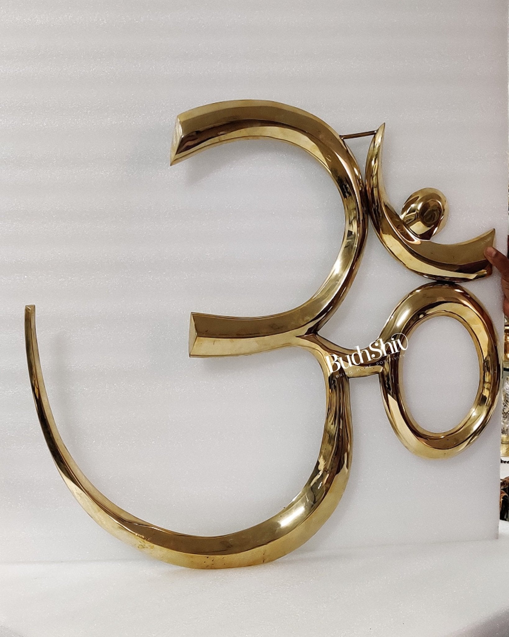 Brass OM wall hanging inches