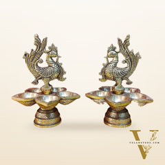 Brass peacock oil lamps 9"