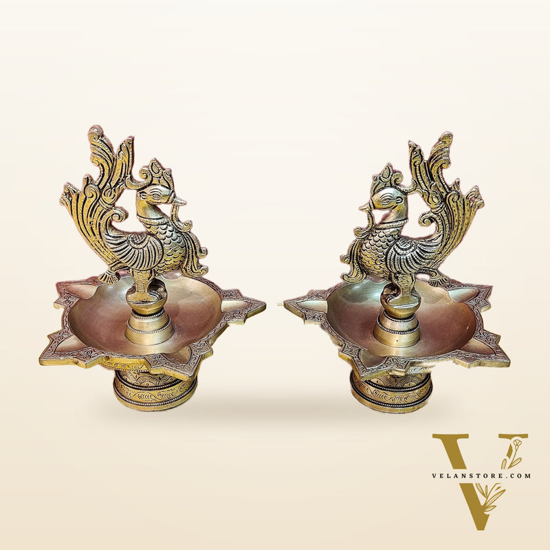 Brass peacock oil lamps 9"