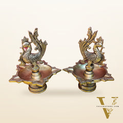 Brass peacock oil lamps 9"
