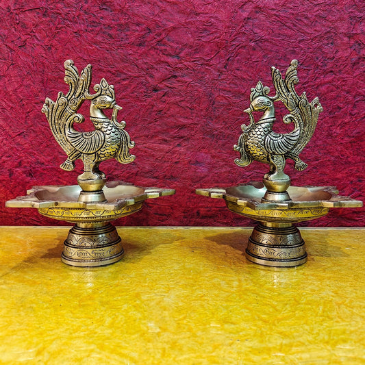 Brass peacock oil lamps 9"