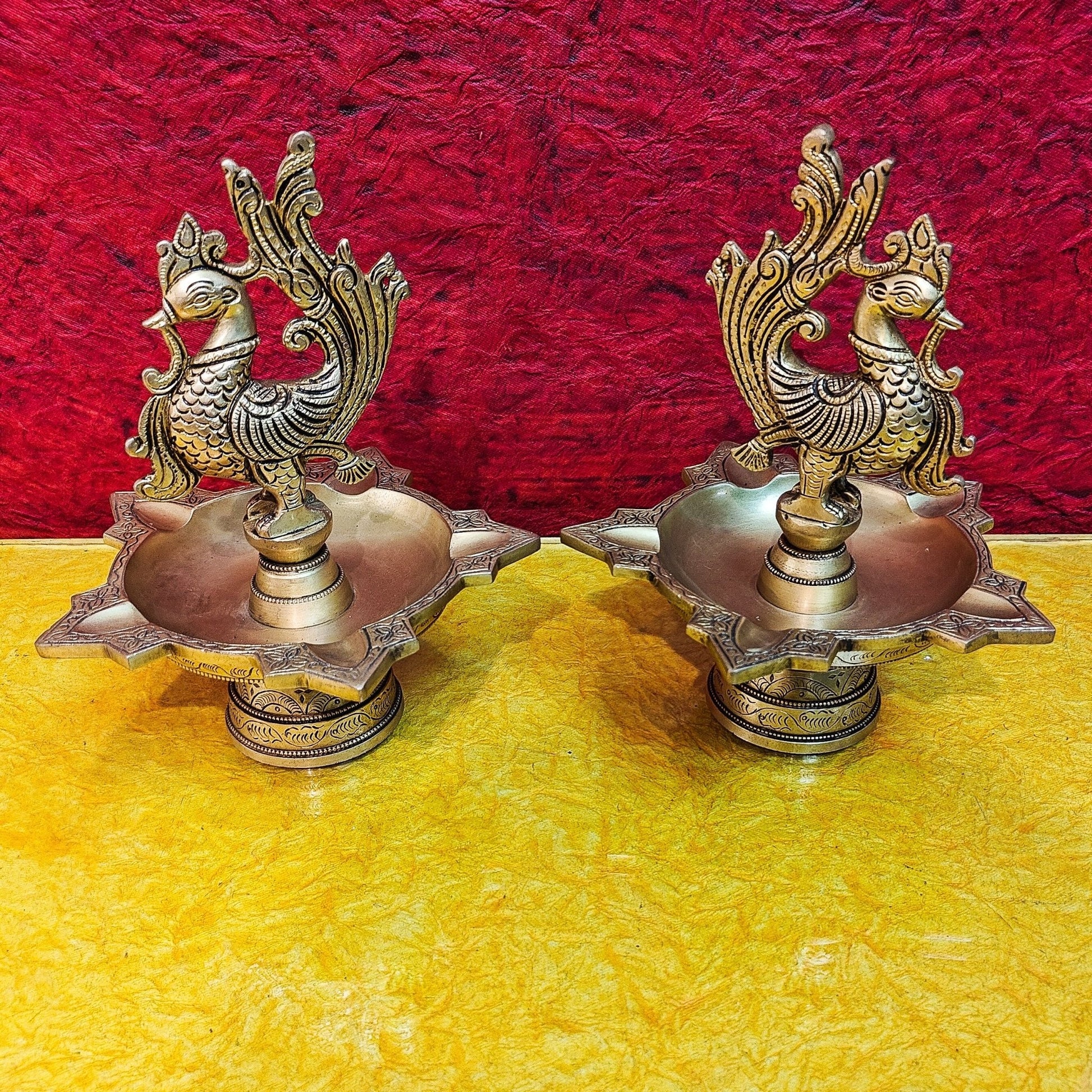 Brass peacock oil lamps 9"