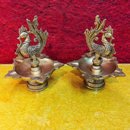 Brass peacock oil lamps 9"