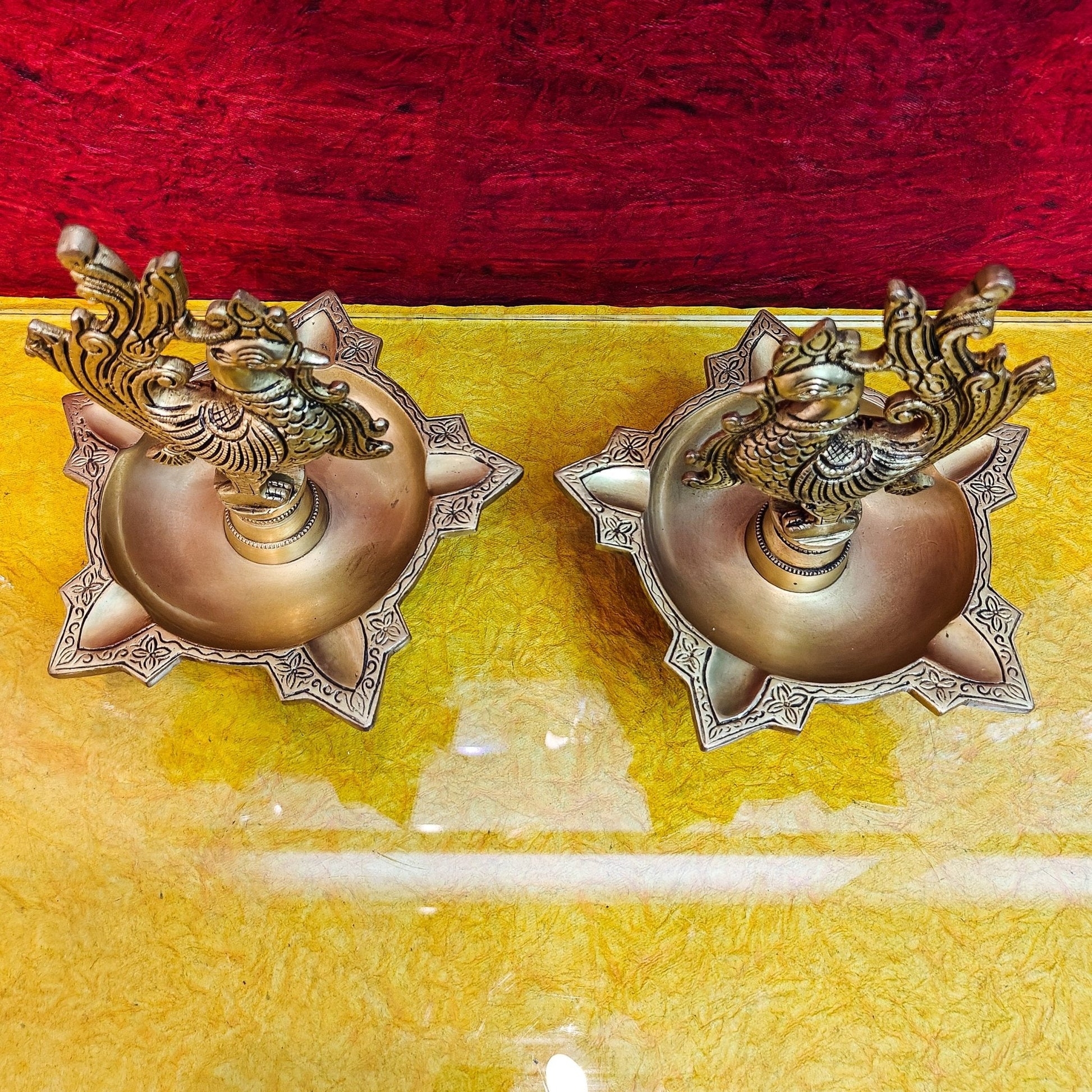 Brass peacock oil lamps 9"