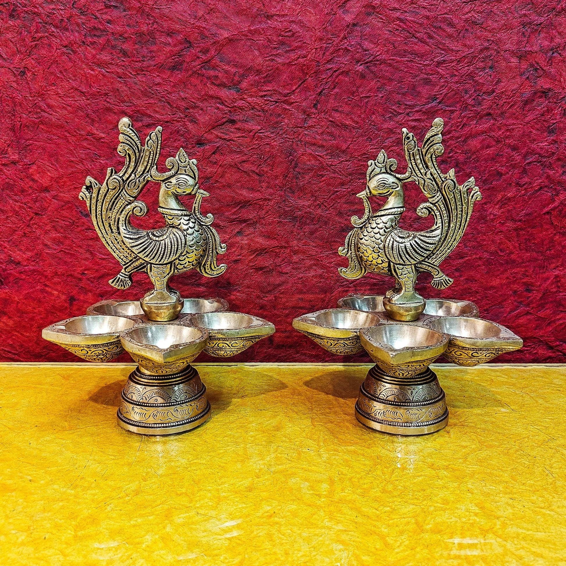 Brass peacock oil lamps 9"