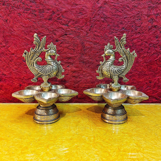 Brass peacock oil lamps 9"