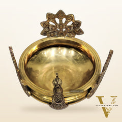 Brass peacock shaped urli golden