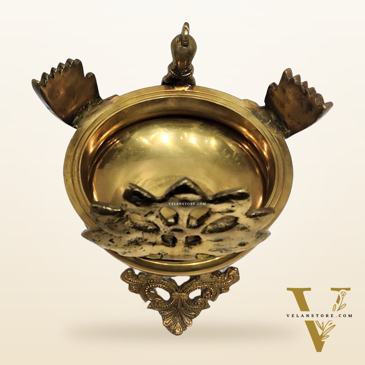 Brass peacock shaped urli golden