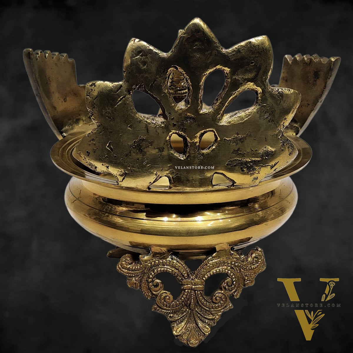 Brass peacock shaped urli golden