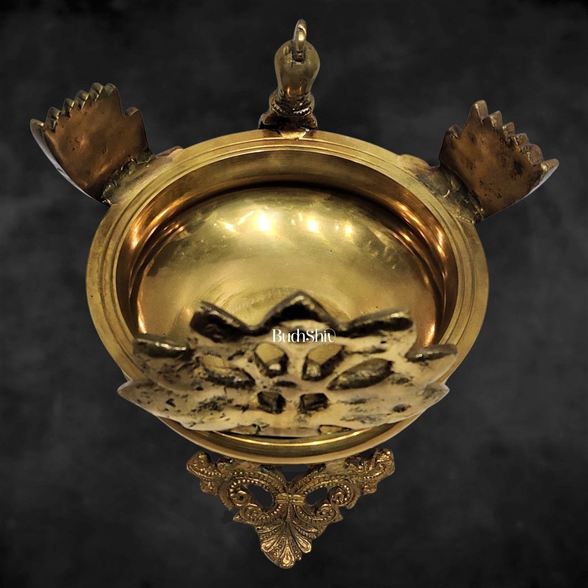 Brass peacock shaped urli golden