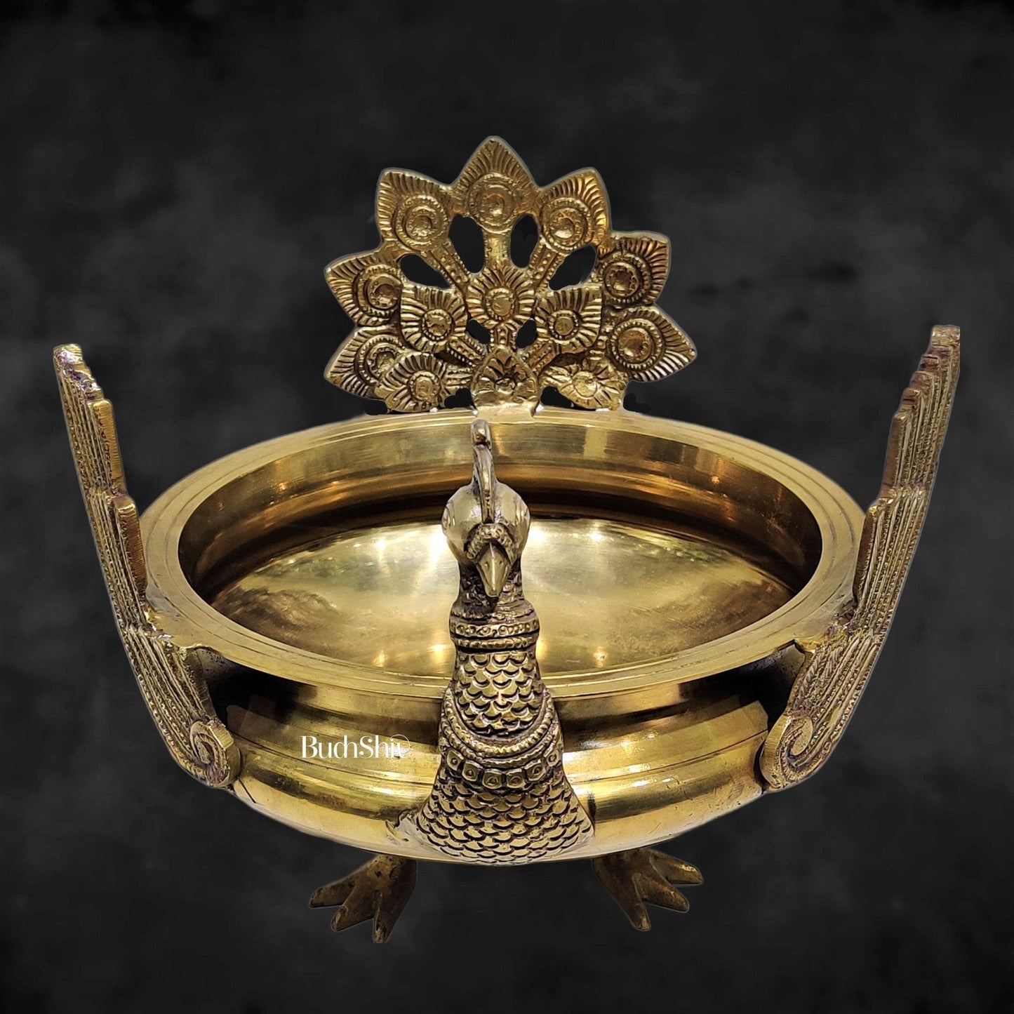 Brass peacock shaped urli golden